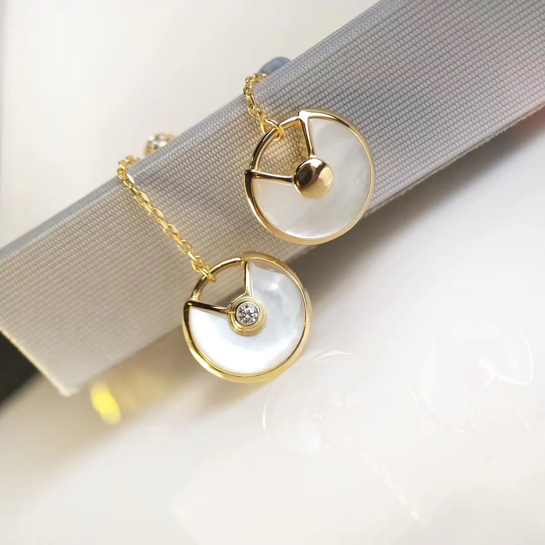 Серьги-амулеты Cartier