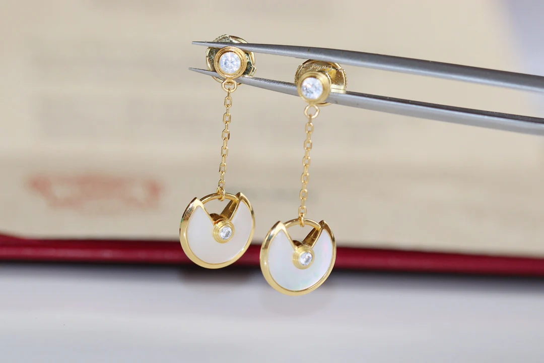 Серьги-амулеты Cartier