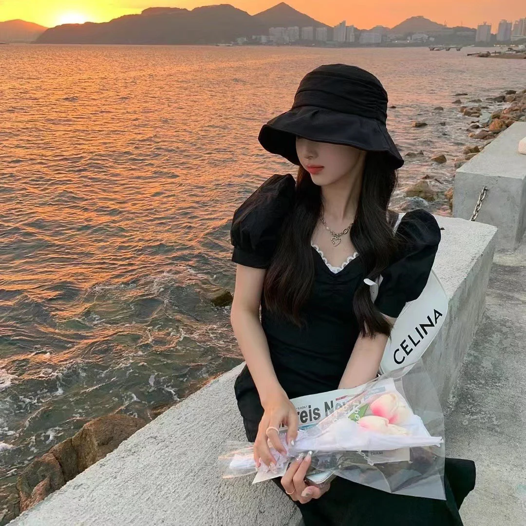 Плиссированная шляпа от солнца от Chanel