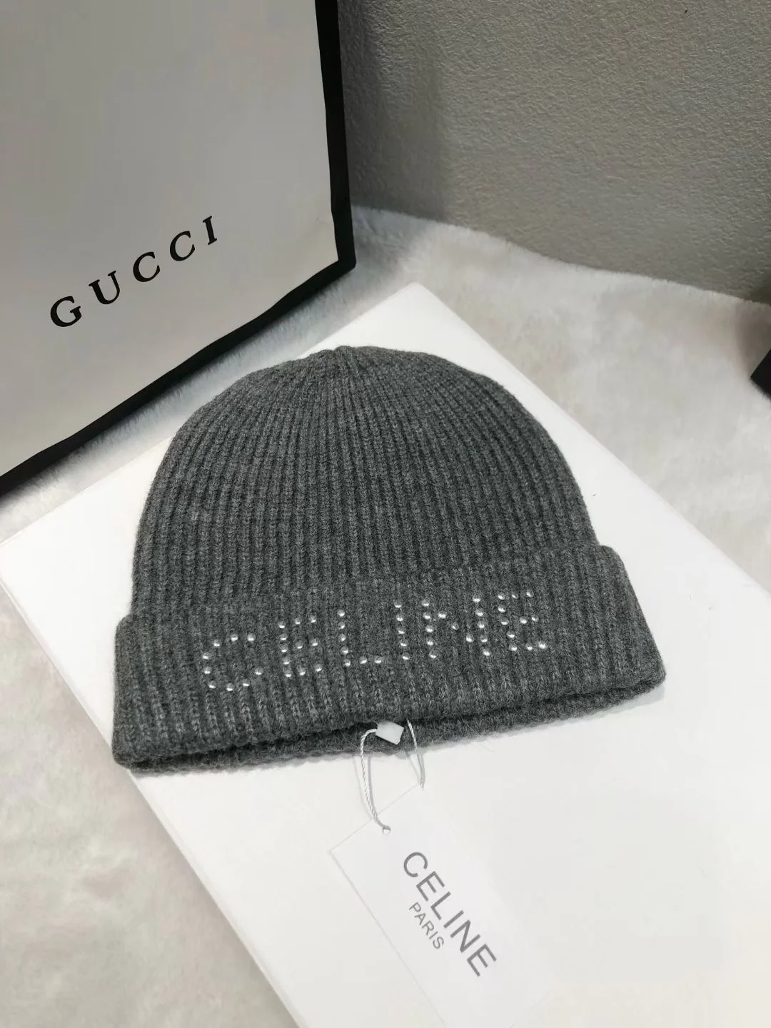 Вязаная шапка Celine с заклепками