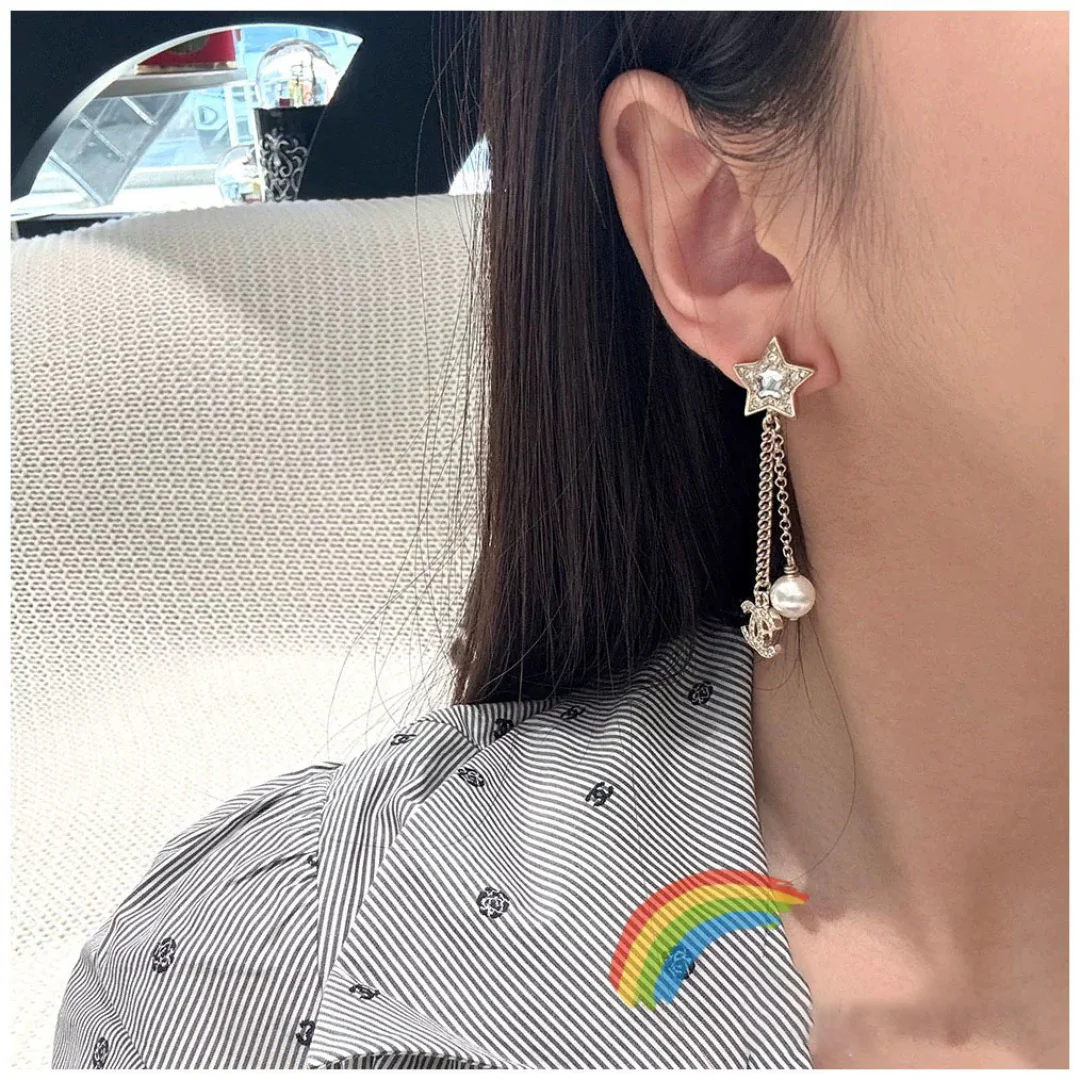 Chanel - Серьги-кисточки в виде звезд (25 пенсов)