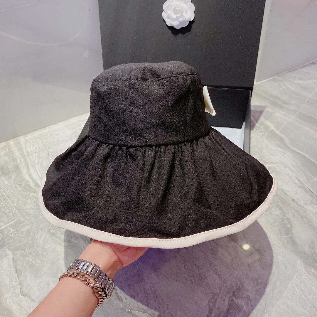 Солнцезащитная шляпа Chanel из ткани, устойчивой к УФ-излучению - Складная широкополая шляпа от солнца - 1 шт.