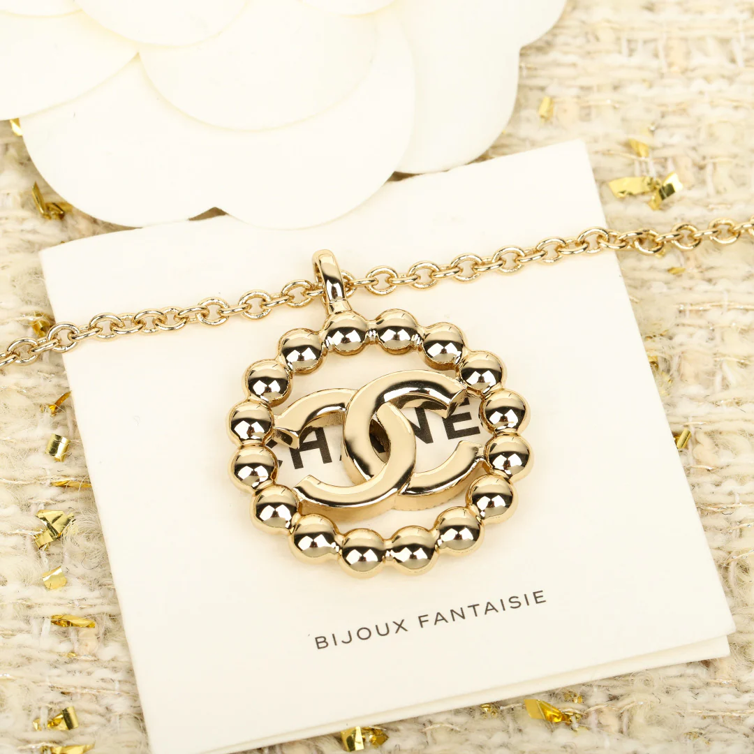 Колье Chanel 25p с ажурным круглым узором и двойной буквой С - Золото - Серебро