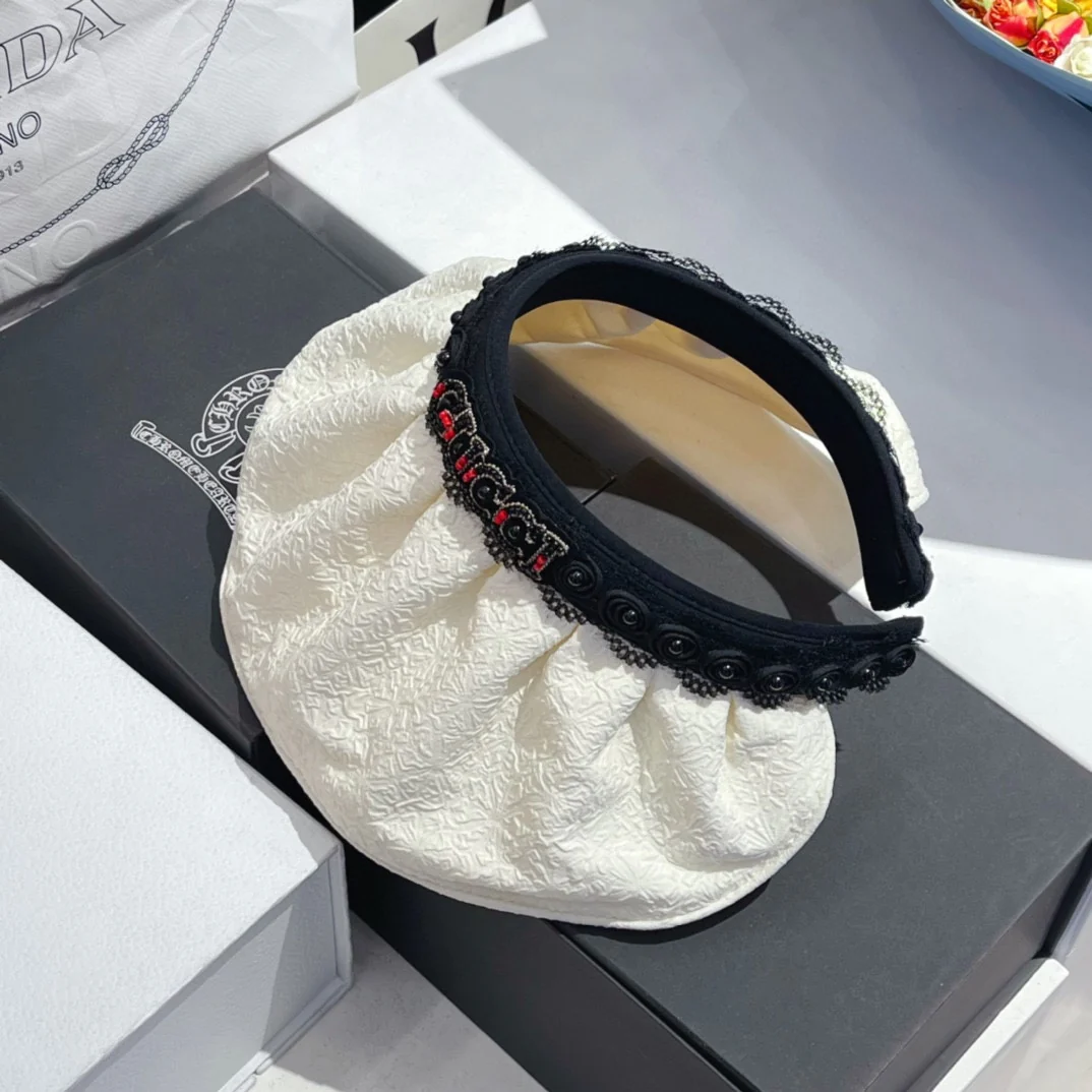 Gucci - Солнцезащитная шляпа с ажурным жемчугом