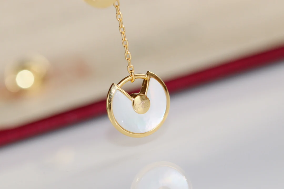 Серьги-амулеты Cartier