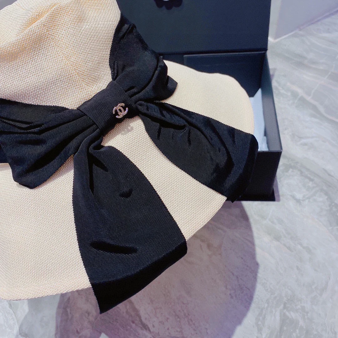 Шляпа Chanel с большим бантом от солнца