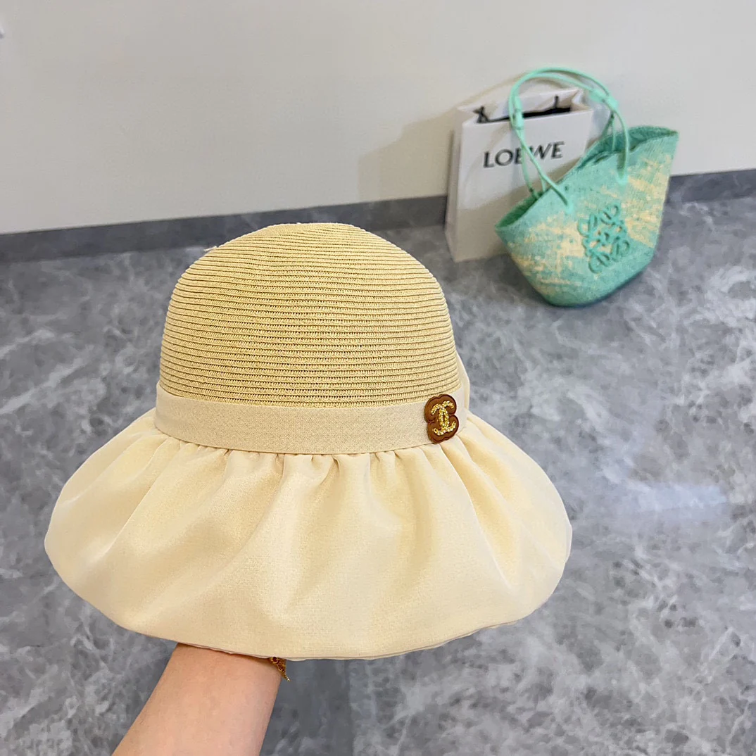 Новая широкополая солнцезащитная шляпа Chanel с бантом, коллекция весна/лето 2024, абрикосовый цвет.