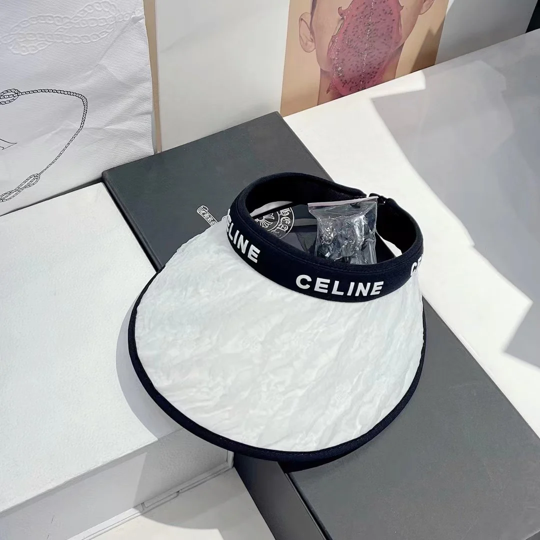 Солнцезащитная шляпа Celine черно-белого цвета с открытым верхом