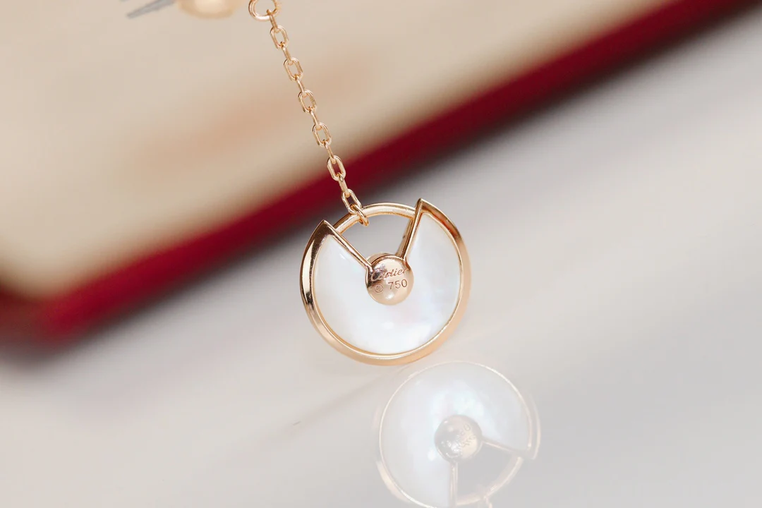 Серьги-амулеты Cartier