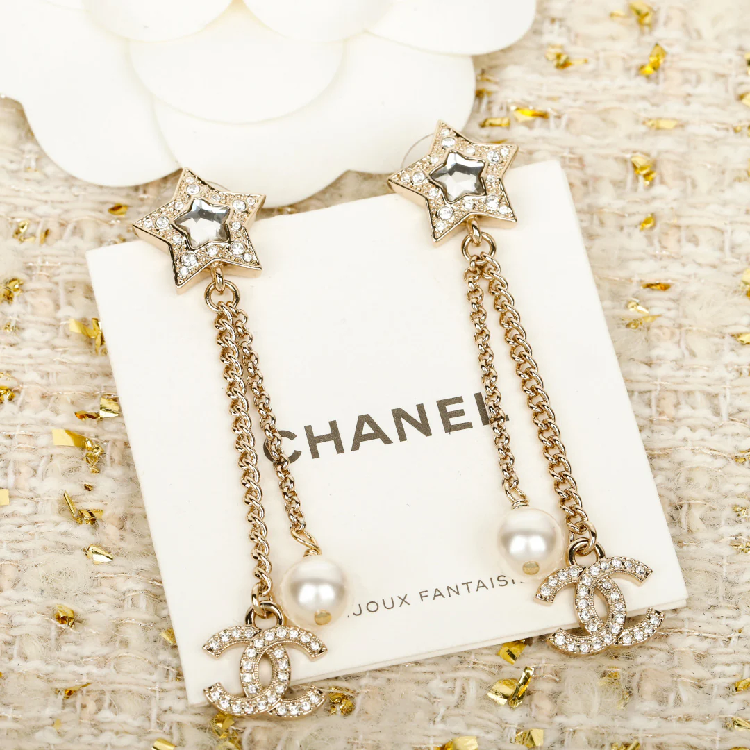 Chanel - Серьги-кисточки в виде звезд (25 пенсов)