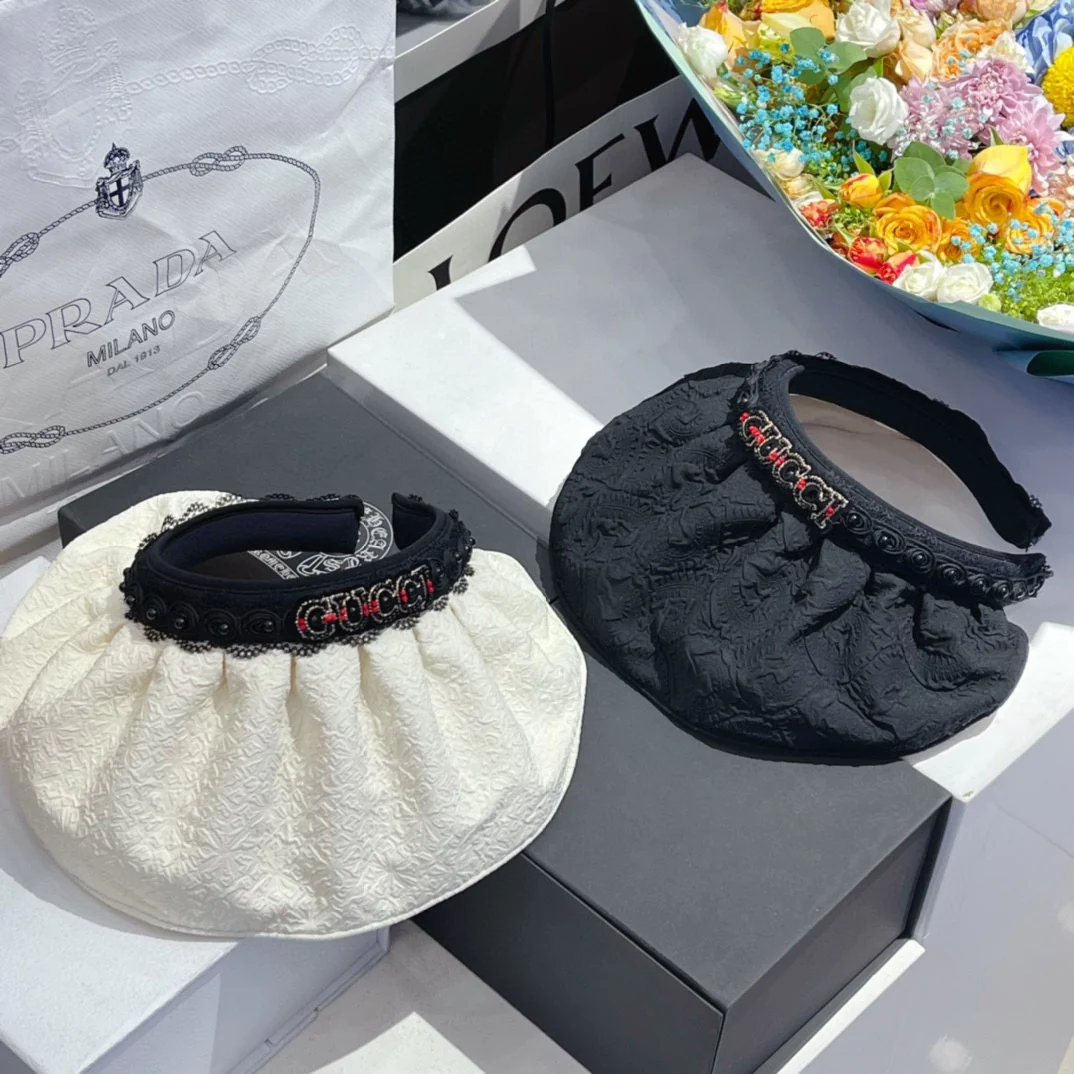 Gucci - Солнцезащитная шляпа с ажурным жемчугом