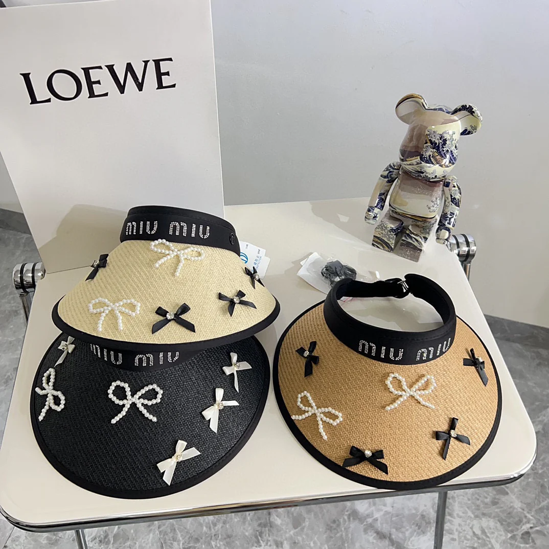 Новая летняя солнцезащитная шляпа Miu Miu 2024 с жемчужным бантом - черная.