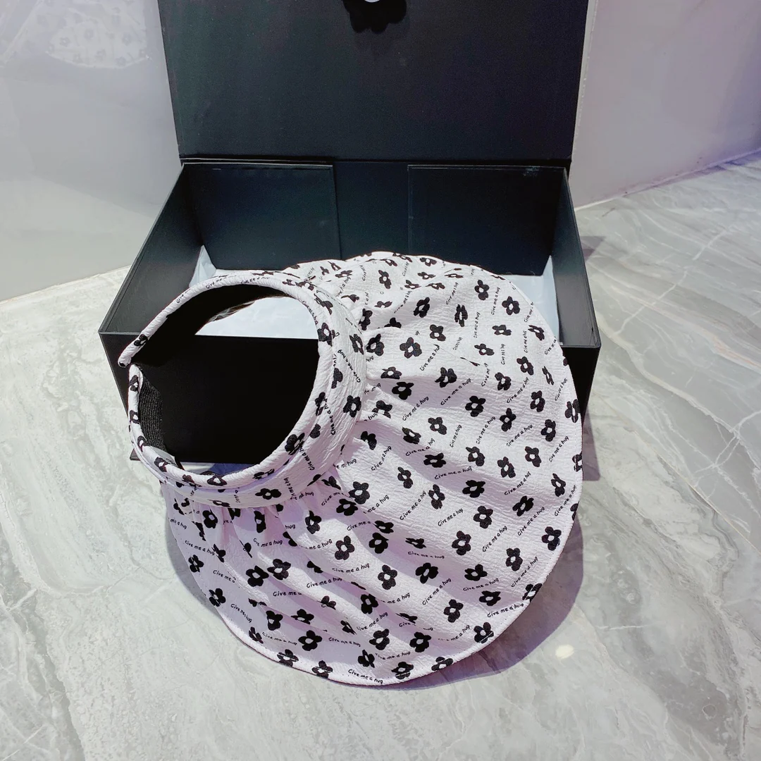 Солнцезащитная шляпа Dior с цветочным узором - ткань с защитой от УФ-излучения