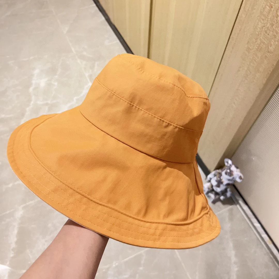 Новая рыбацкая шляпа Miu Miu 2023 с бантом - желтая.