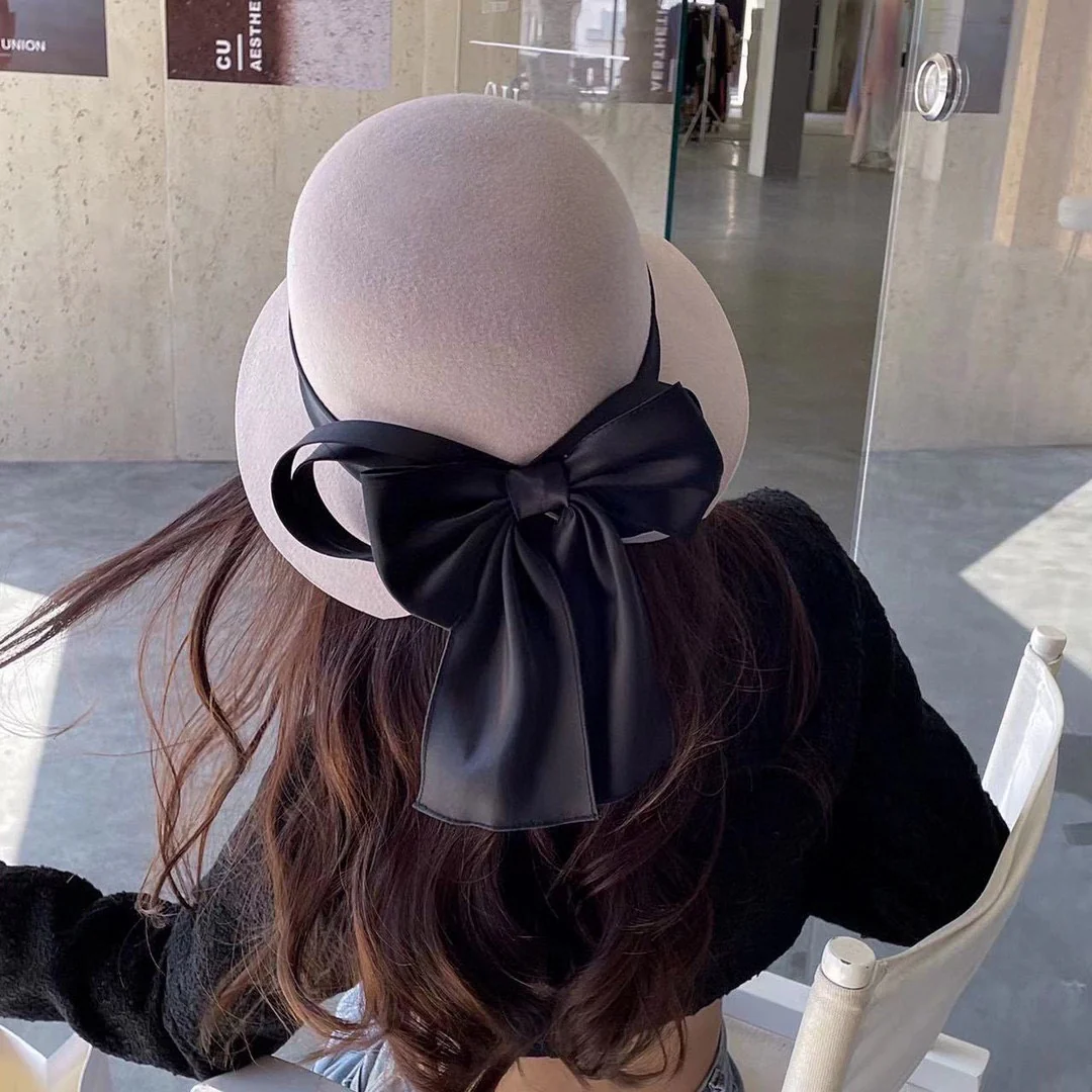 Шерстяная шляпа Chanel - абрикосового цвета - 1