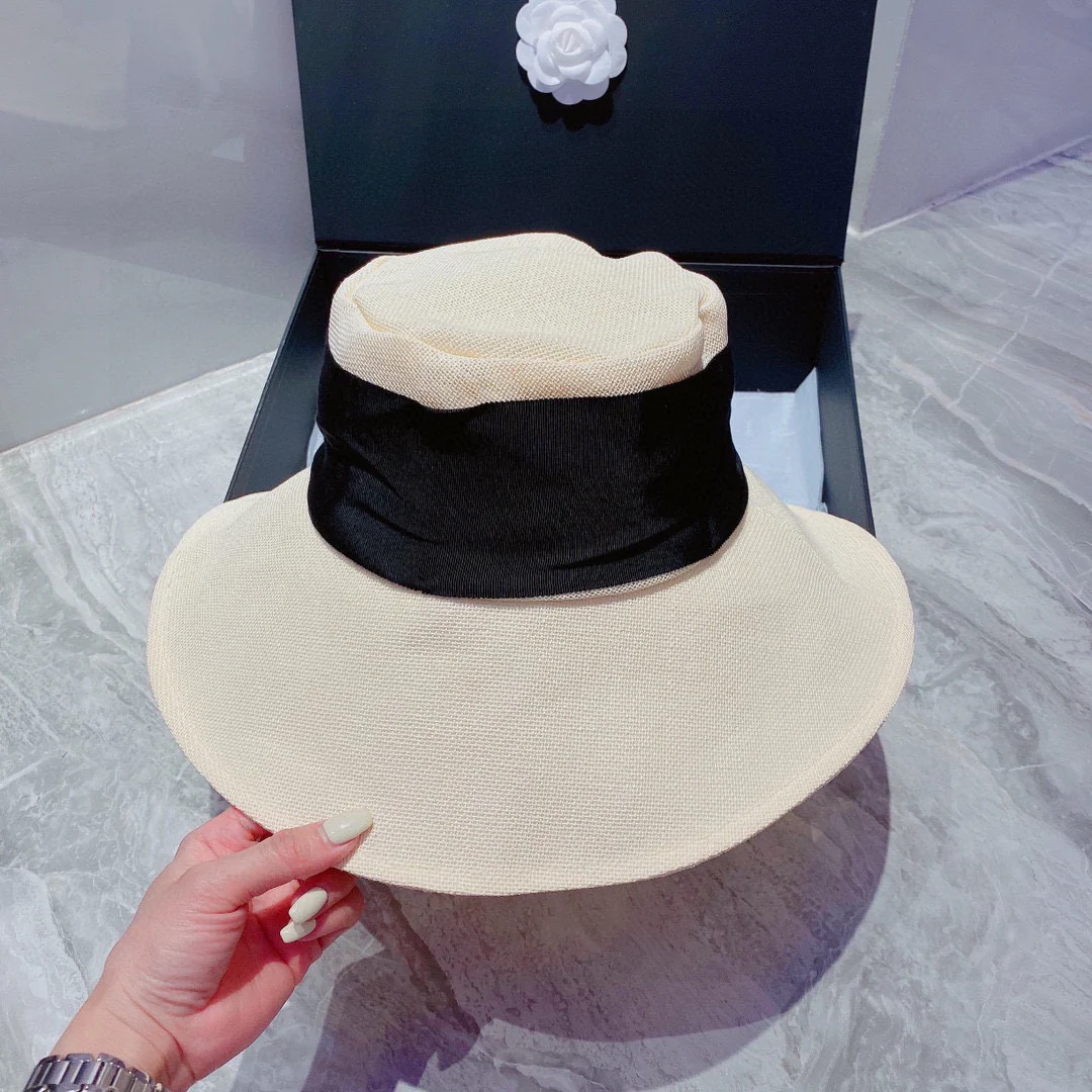 Шляпа Chanel с большим бантом от солнца