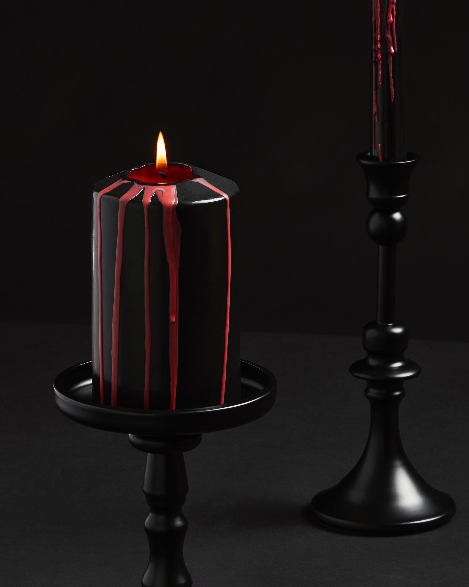 Bleeding Pillar Candle Black & Red Unscented