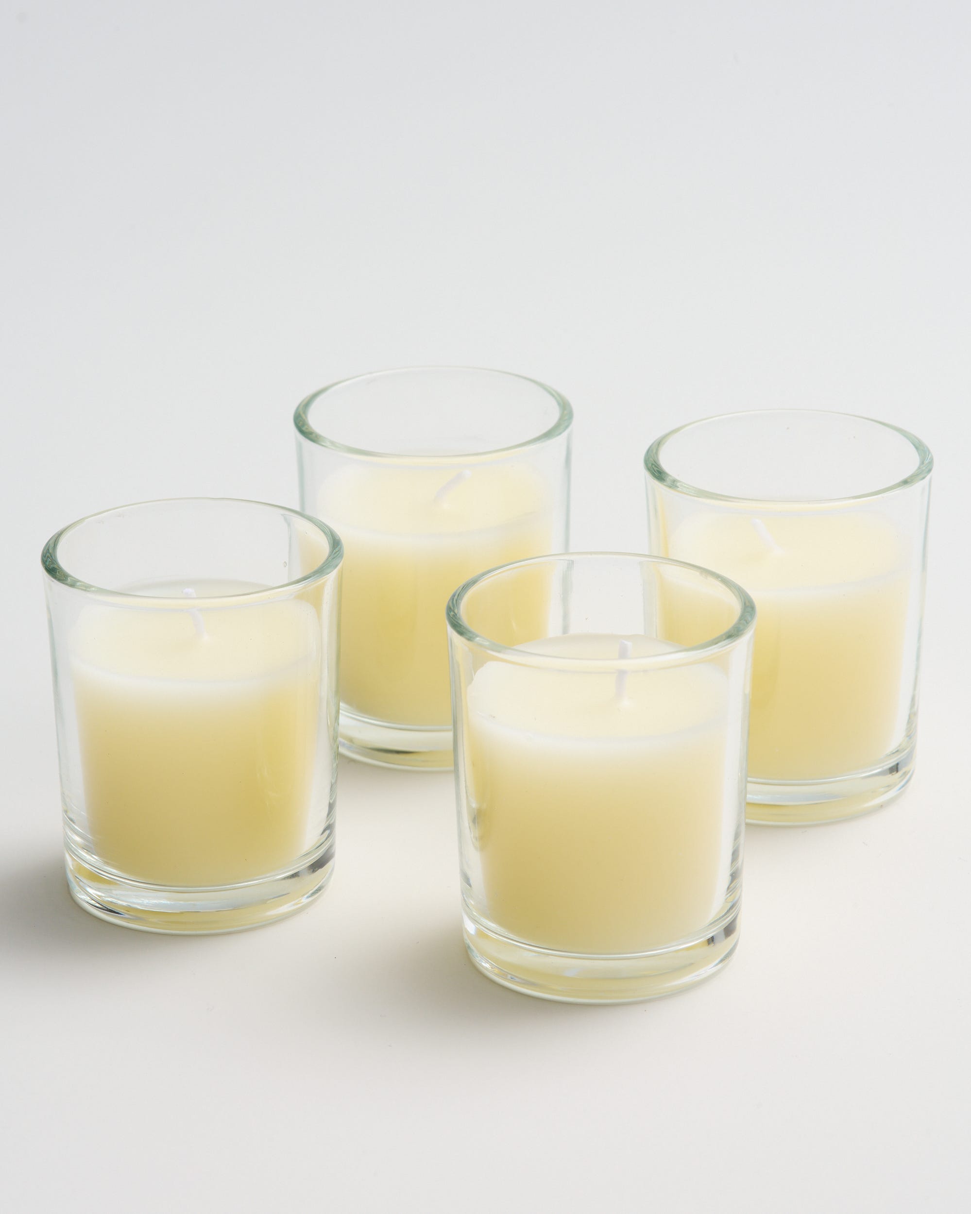 Unscented Glass Votives Candles Ivory 4 Pack