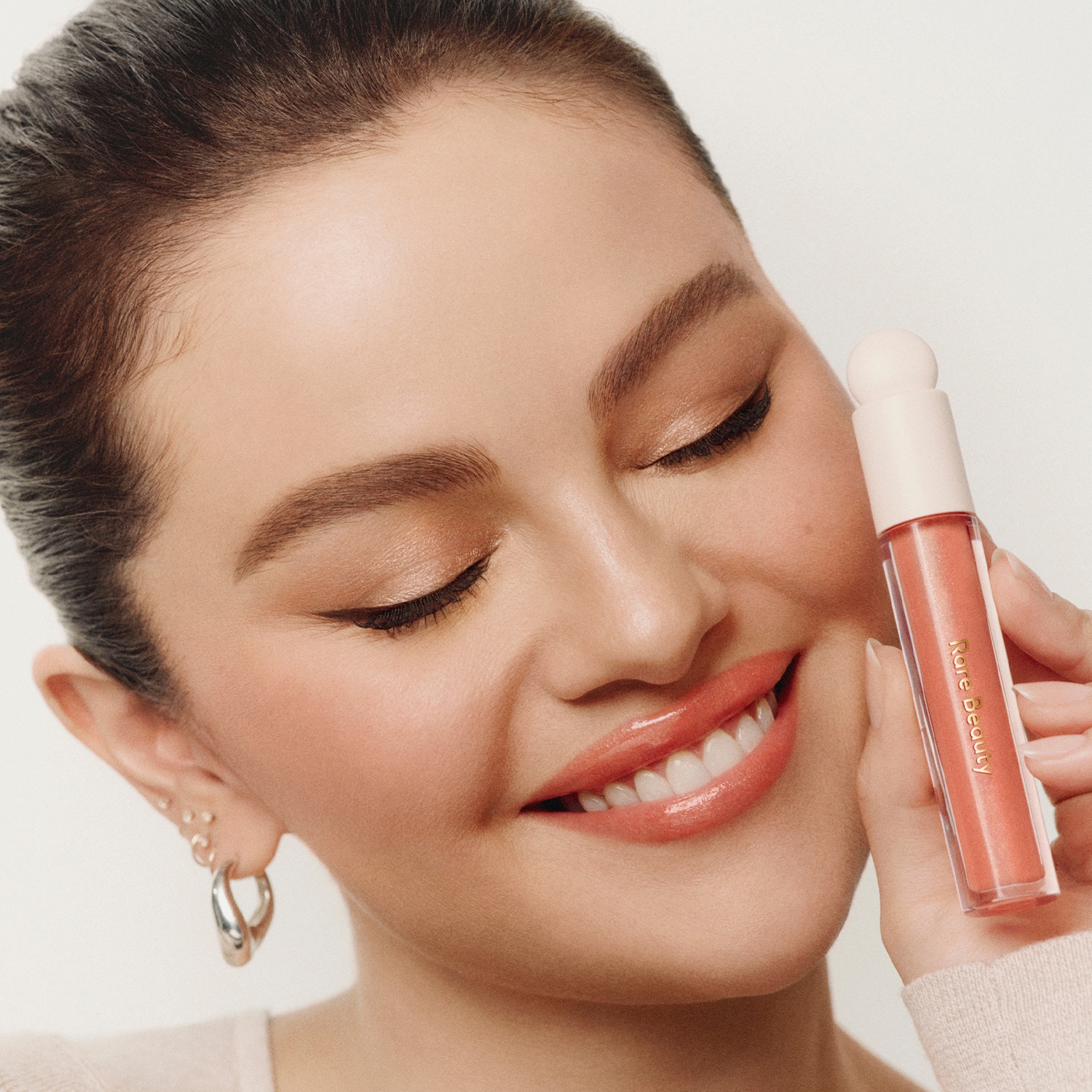 Positive Light Luminizing Lip Gloss - Brillo de labios iluminador