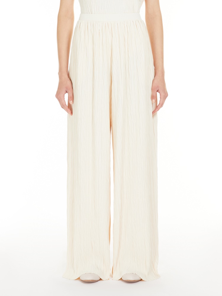 Wide-fit pleated jersey trousers