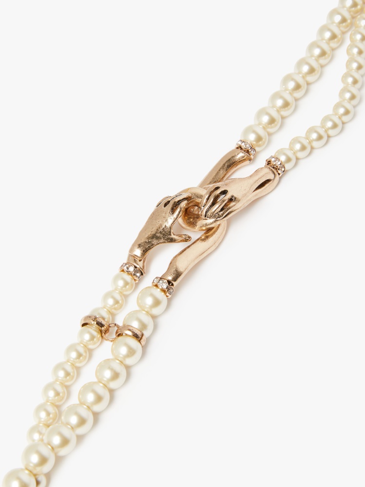 Necklace with double string of pearls