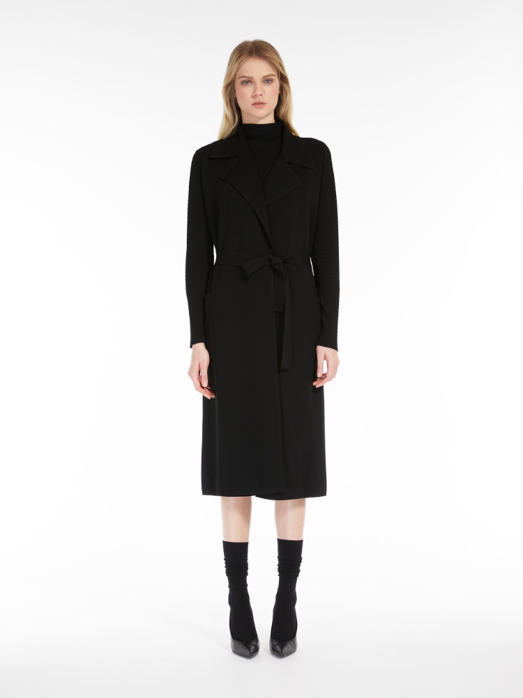 Belt-adorned long knitted heavy jacket