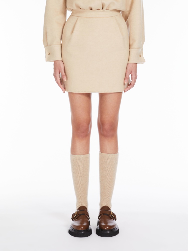 Ivory camel colour mini skirt