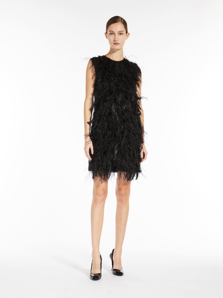 Short dress with feathers