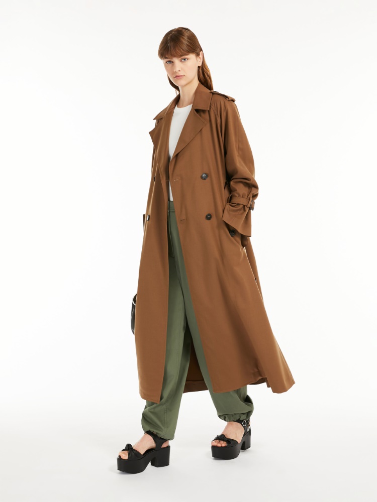 Belted trench coat in showerproof fabric