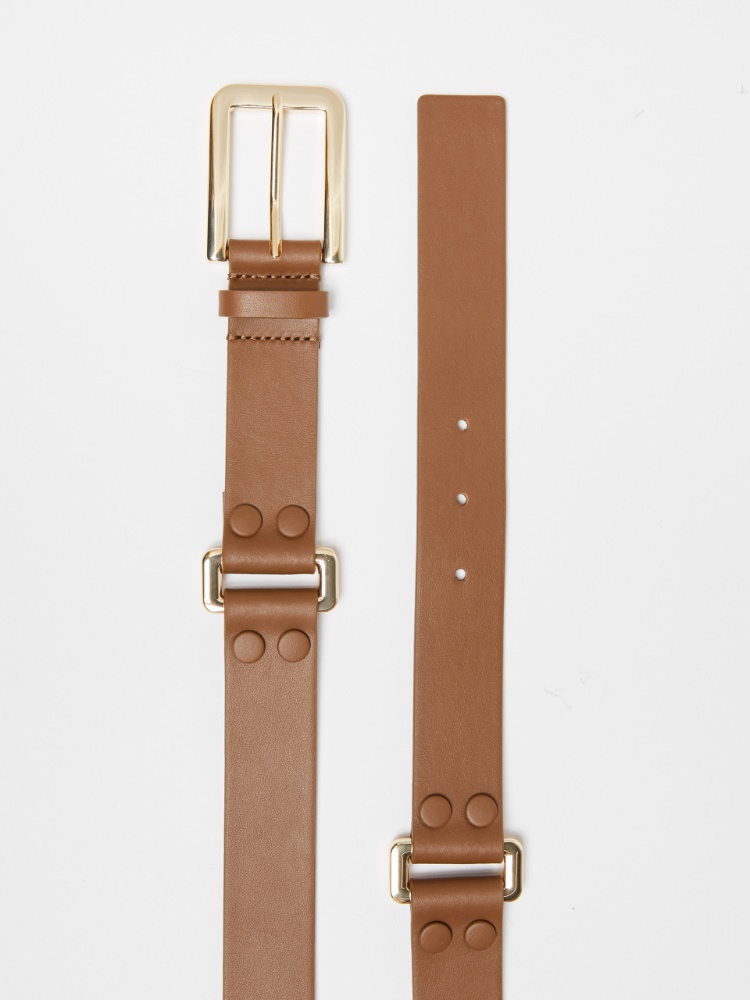 Leather belt with metallic rings