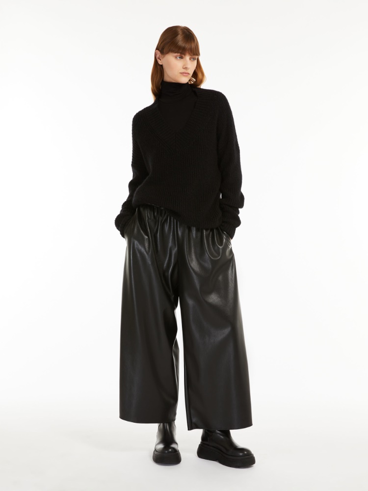 Coated jersey trousers