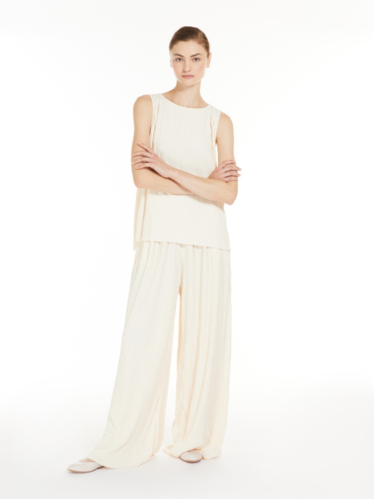 Wide-fit pleated jersey trousers
