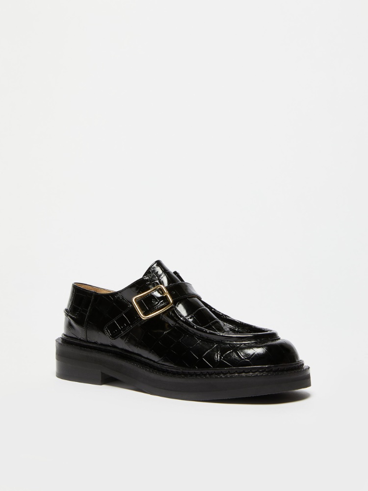 Crocodile-print leather moccasins