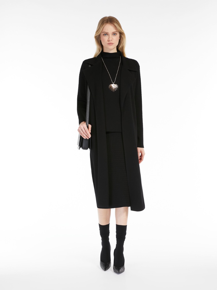 Belt-adorned long knitted heavy jacket
