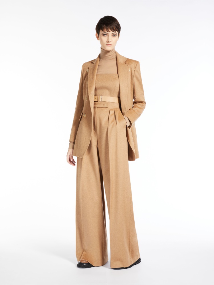 Wide, camel colour trousers