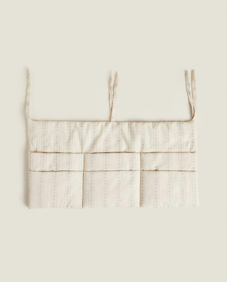 MUSLIN ORGANISER WITH BORDER