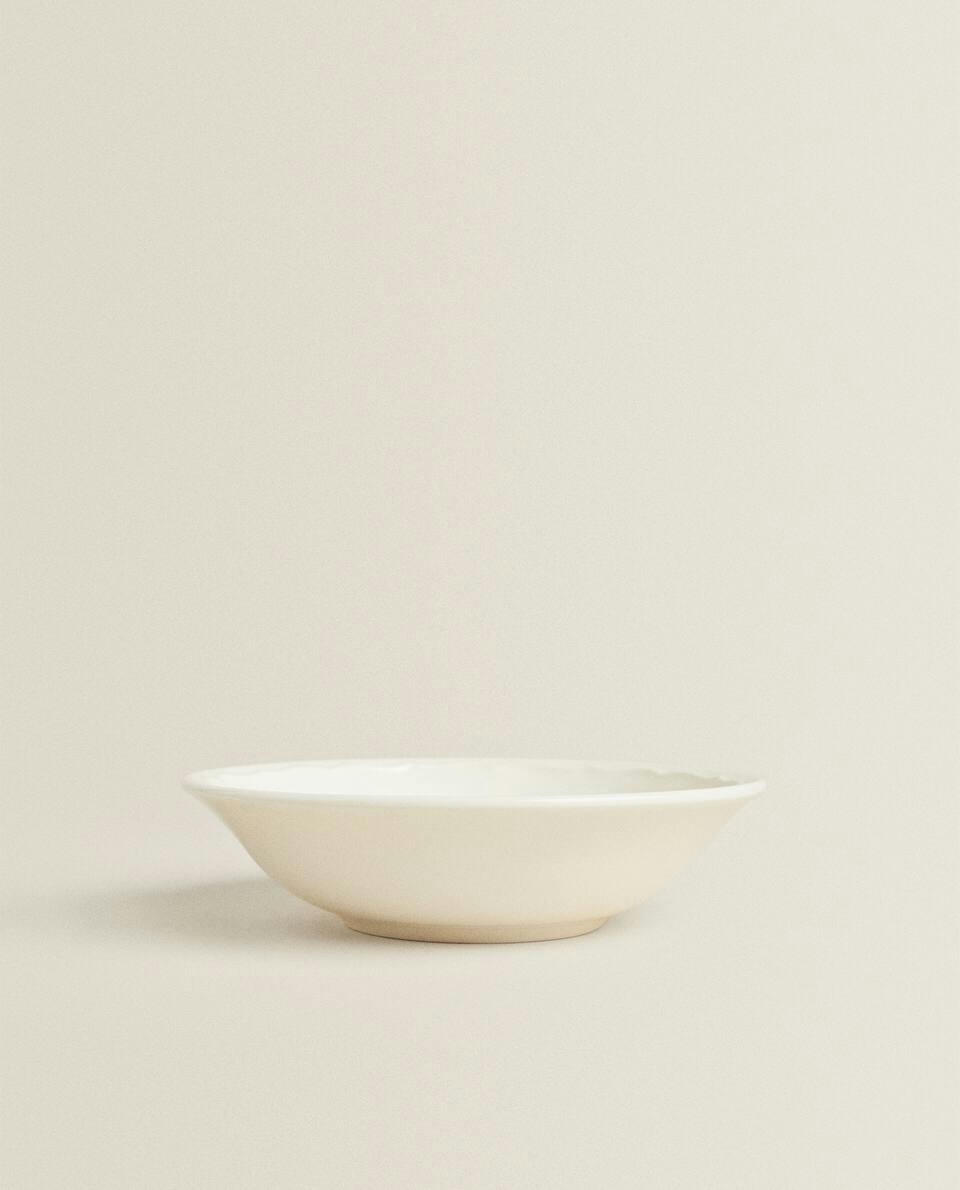 EARTHENWARE BOWL WITH RAISED-DESIGN EDGE