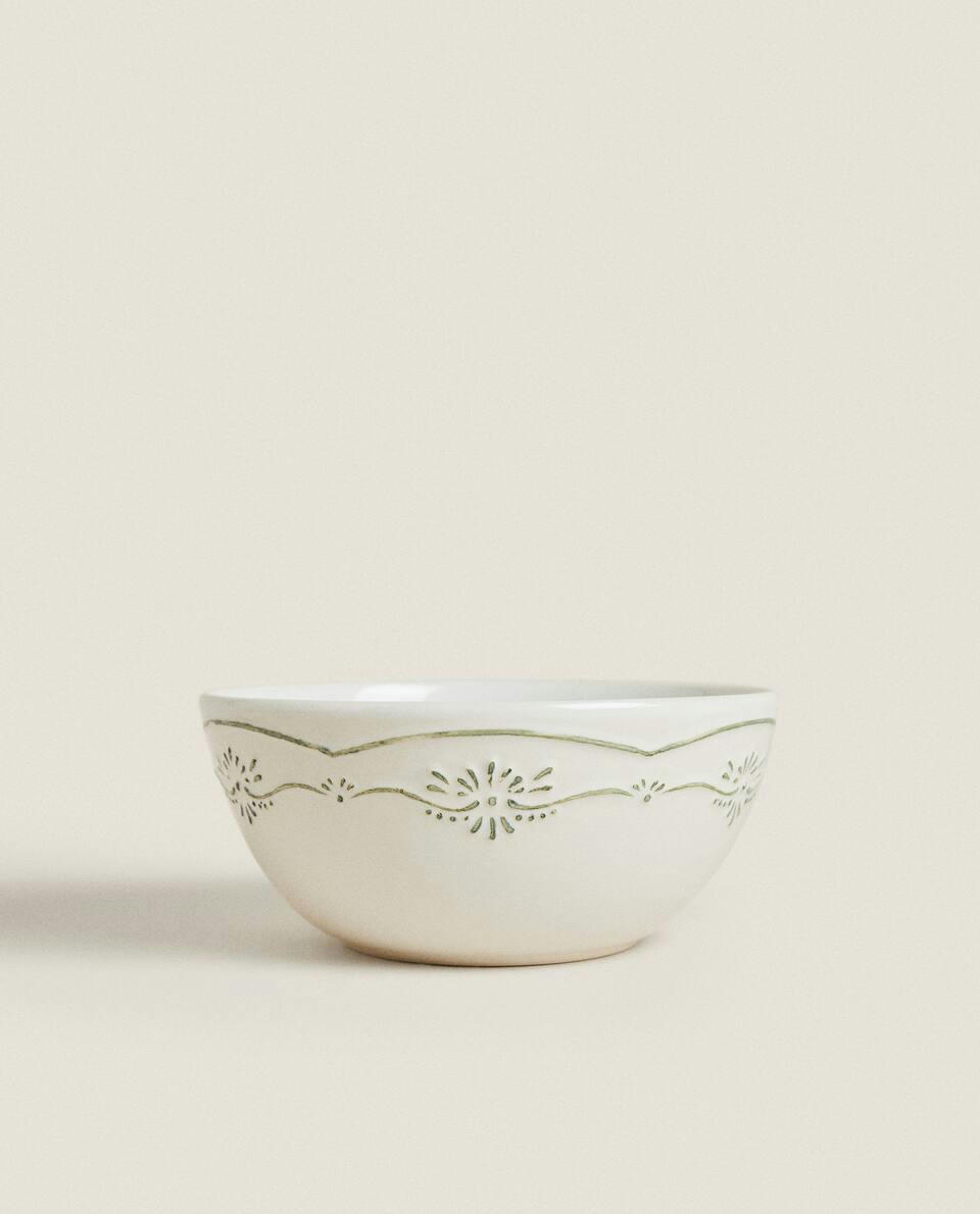 EARTHENWARE BOWL WITH RAISED CHRISTMAS DESIGN