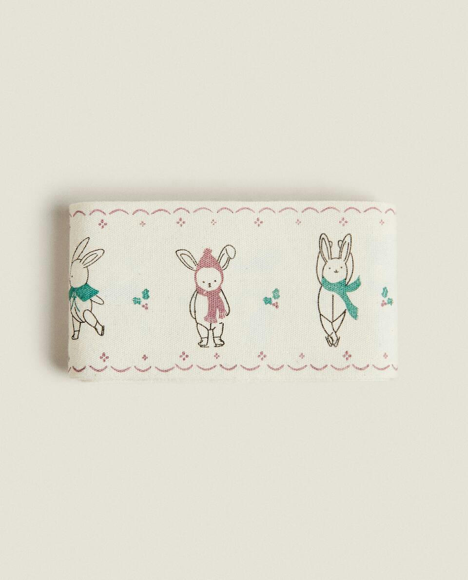 CHILDREN’S WRAPPING PAPER WITH CHRISTMAS BUNNY RABBITS