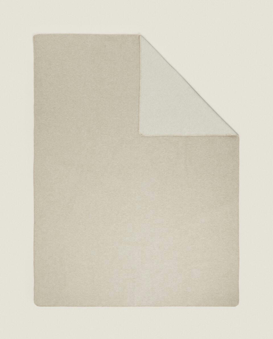 DOUBLE-FACED BLANKET