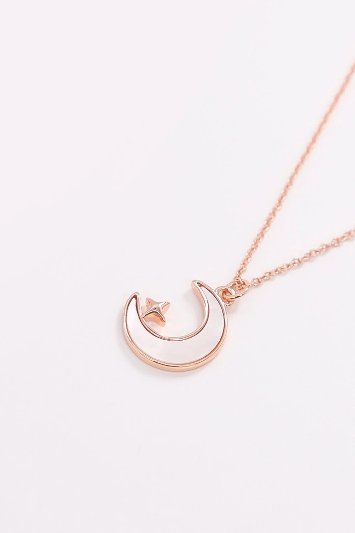 Star and Moon Necklace in Rose Gold