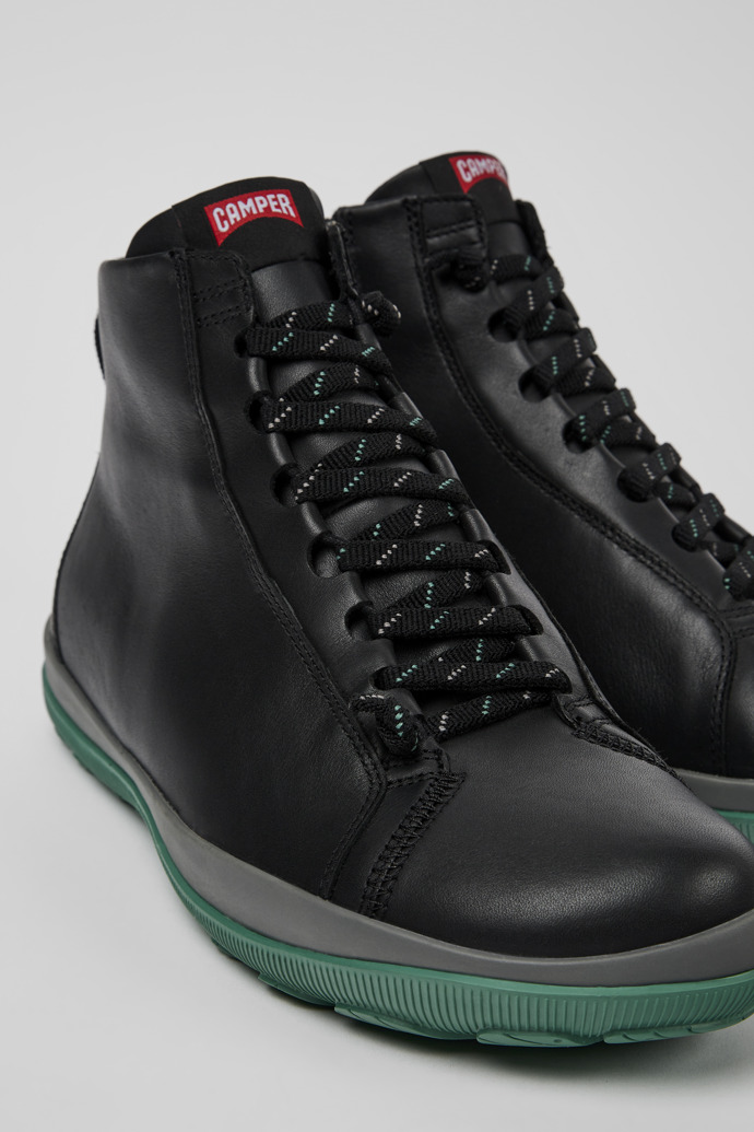 Botines negros de piel para hombre