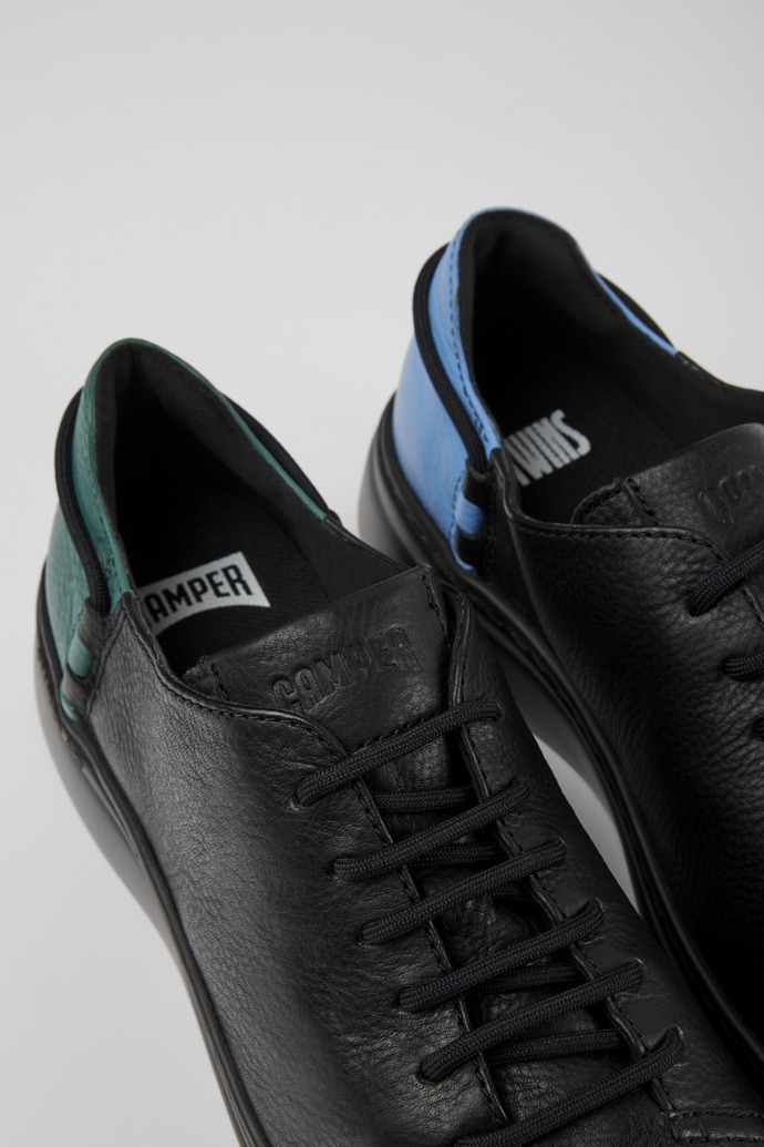 Sneakers negras de piel para mujer