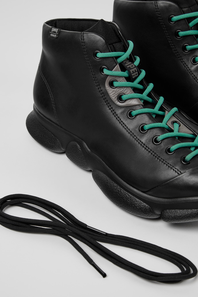 Sneakers negras de piel para hombre