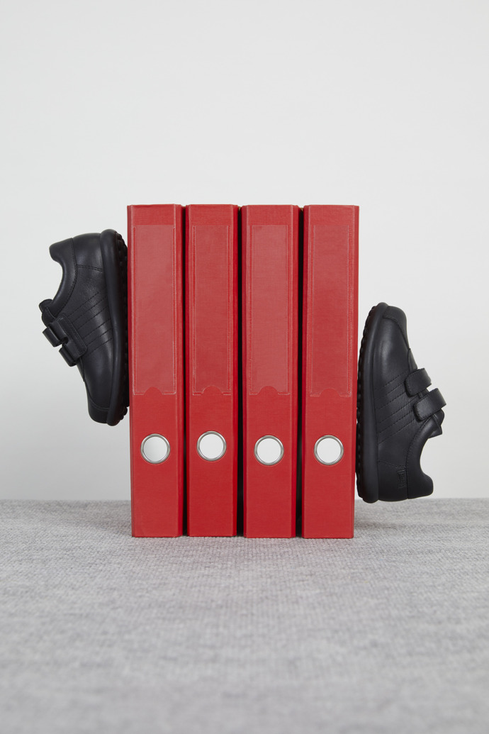 Zapatos de tejido y piel negros