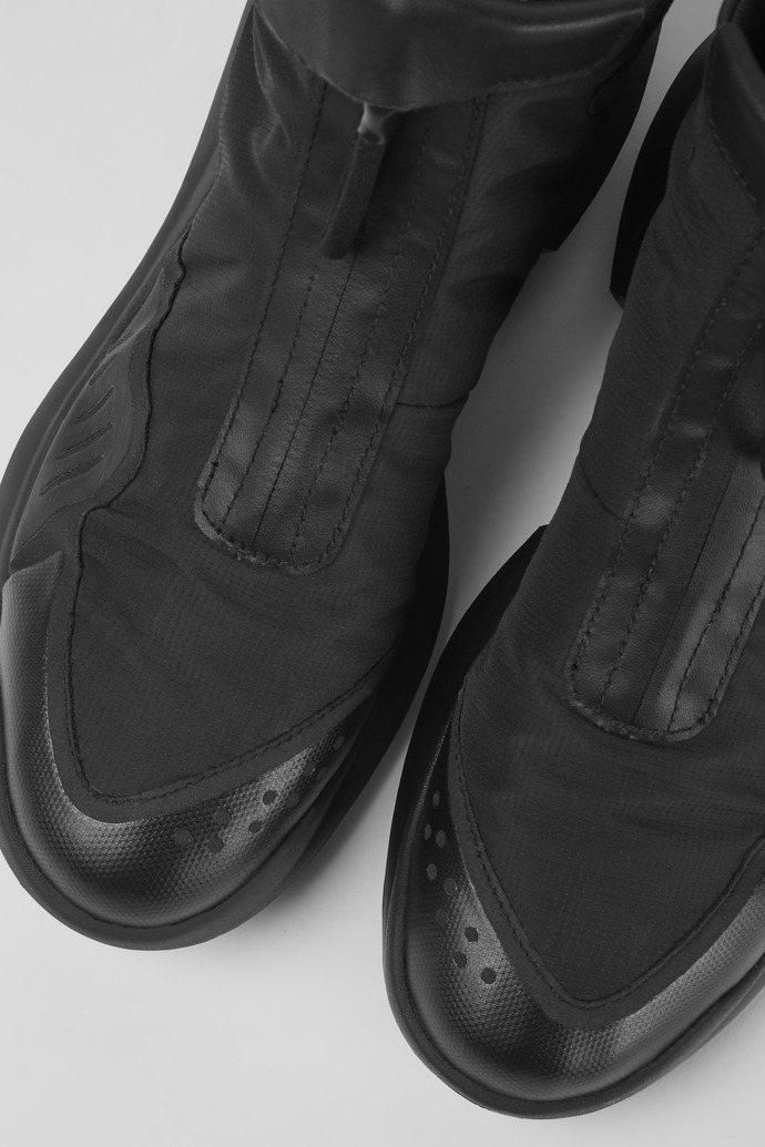 Botines de tejido en color negro para mujer