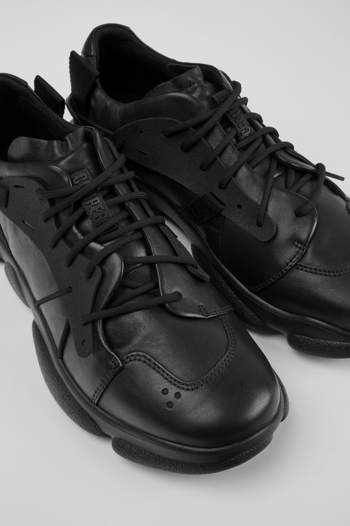 Sneakers negras de piel y tejido para hombre