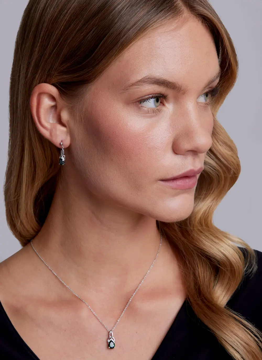 Sterling Silver Trinity Knot Drop Earrings with Green Stone