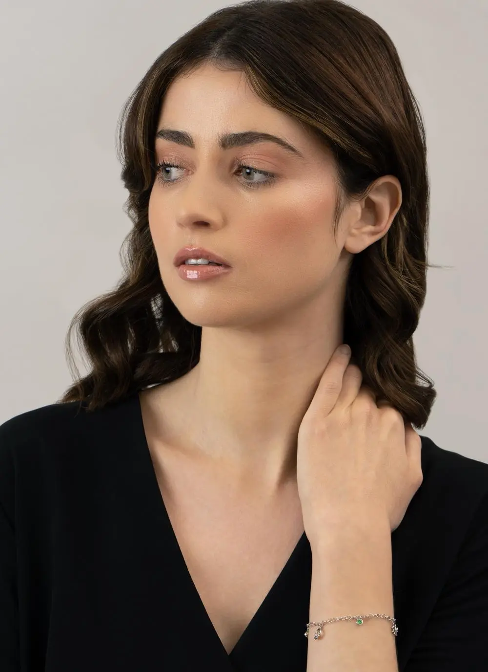 Sterling Silver Celtic Charm Bracelet with Green Cubic Zirconia