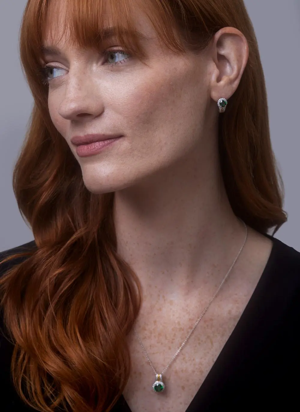 Sterling Silver Celtic Knot Halo Earrings with Green Cubic Zirconia